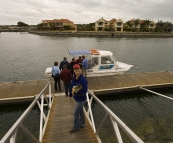 Lisa walking to the boat for a tour of some of the Port Lincoln fish farms