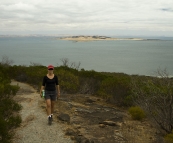 Lisa on the trail up Stamford Hill with Boston Island in the distance