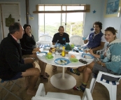 Bob, Gina, Sam, Chris and Lisa around the dinner table at Nora Creina