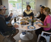 Chris, Cathy, Gina and Lisa admiring the dinner spread