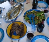 Fresh fish, salad and some good-looking steaks for dinner