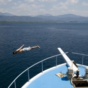 Sam diving off the boat for a dip in the Mediterranean