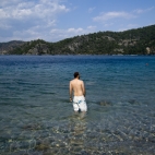 Sam contemplating a swim at Holiday Bay