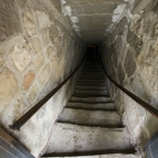 The stairs down to the castle\'s dungeons