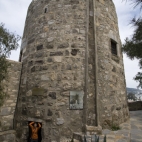 Lisa exiting the castle\'s snake tower