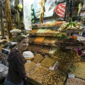 Lisa in front of dried fruits and nuts in the Spice Bazaar