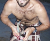 Sam and a small Salmon Trout at Johanna Beach