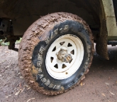 The mud getting the better of the Cooper Discoverers along the Zeka Spur Track