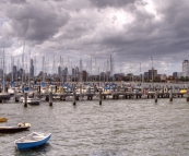 Yachts at the Saint Kilda Pier with the city of Melbourne in the background