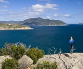 Lisa at Pillar Point with some of the Wilsons Promontory islands in the distance