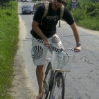 Sam on his bike riding between Hoi An and the beach