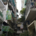 The tight lane leading to our hotel: Quan San (the sign is just visible down the end of the lane)