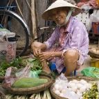 Locals peddling their wares in Hoi An's central market