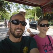 Sam and Lisa in a cyclo taking a tour across Hanoi