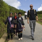 Sam with Mi (our guide) and a couple of other H'Mong girls on the way to Cat Cat Village