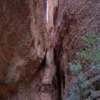 Lisa dwarfed by the walls of Echidna Chasm