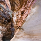 The thin layer of crust over sandstone responsible for the zebra-like domed rock formations