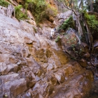 Sam clambering up a waterfall in EL Questro Gorge