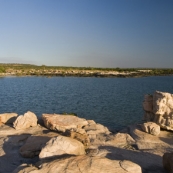 The rocks and beach at McGowan's Island