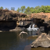 Sam diving into the swimming hole next to our campsite at King Edward River