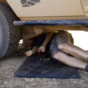 Sam repairing the water tank at our campsite next to the Gibb River