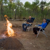 Enjoying a beer by the campfire at Chile Creek