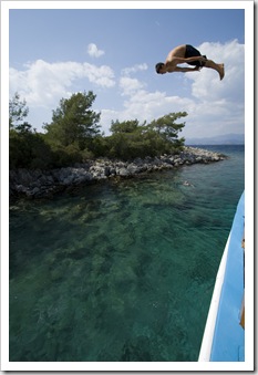 One of the deckhands showing us how it's done from the top deck of our boat