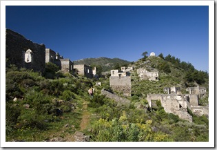 Lisa hiking through the ghost town of Kayakoy