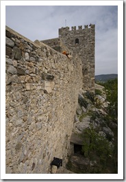 Lisa walking between the upper towers of the Bodrum castle