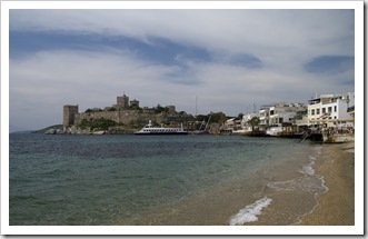 View of the Bodrum castle and beachfront restaurants in the eastern bay