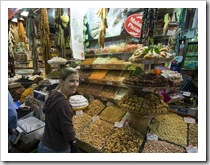 Lisa in front of dried fruits and nuts in the Spice Bazaar