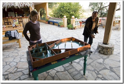 Lisa and Themis playing ancient pinball at Rolling Stone