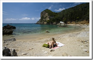 Lisa on the beach in an empty cove at Paleokastritsa