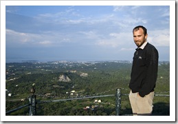 Sam at Kaiser's Throne with a view across Kerkyra to Kerkyra Town in the background