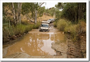 Lisa mastering one of the deeper water crossings on the road into Purnululu