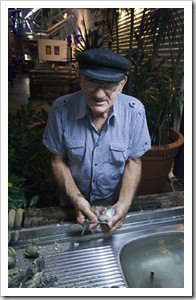 The oyster shucker at Yots Greek Taverna