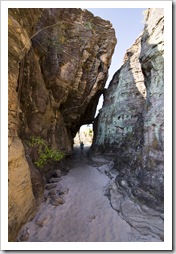 Lisa walking through one of the sandstone crevices along the Bardedjilidji Walk