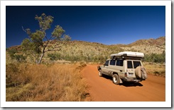 Driving into Purnululu National Park with the Osmand Range in the distance