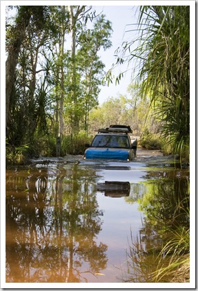 A Land Rover crossing the creek on the road into Tjaynera Falls