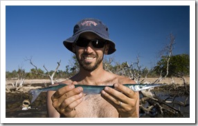 Sam catches a Snook fishing off the rocks north of Pago