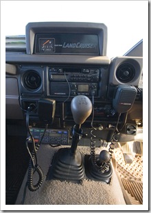 Bottom right is the HF radio control unit, underneath the car stereo is the UHF radio transceiver and up top is the auxillary fuel tank gauge