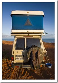 MSC gear bag hanging off one of the spare tires (we use the bag for carrying firewood), Zifer Maggiolina rooftop tent and underneath that is the rolled-up Fiamma F35 awning