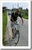 Sam on his bike riding between Hoi An and the beach