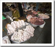 A meat stall specializing in intestines, ears, stomachs, livers, pancreas...