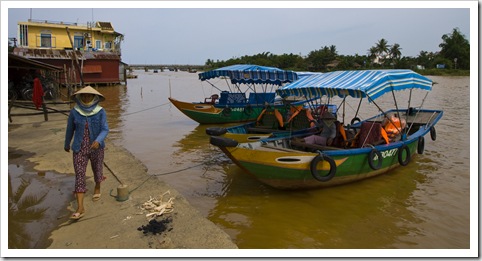 Walking along the river in Hoi An's old town