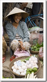 Locals peddling their wares in Hoi An's central market