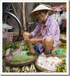 Locals peddling their wares in Hoi An's central market