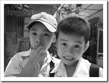 School boys on their way home in Hoi An