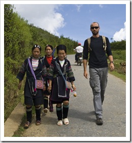 Sam with Mi (our guide) and a couple of other H'Mong girls on the way to Cat Cat Village