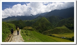 Lisa walking with our H'Mong guides down the trail to Cat Cat Village